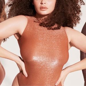 Skims shimmer copper bodysuit NWT size 4xl